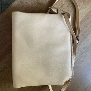 A new day
Cream Crossbody Bag